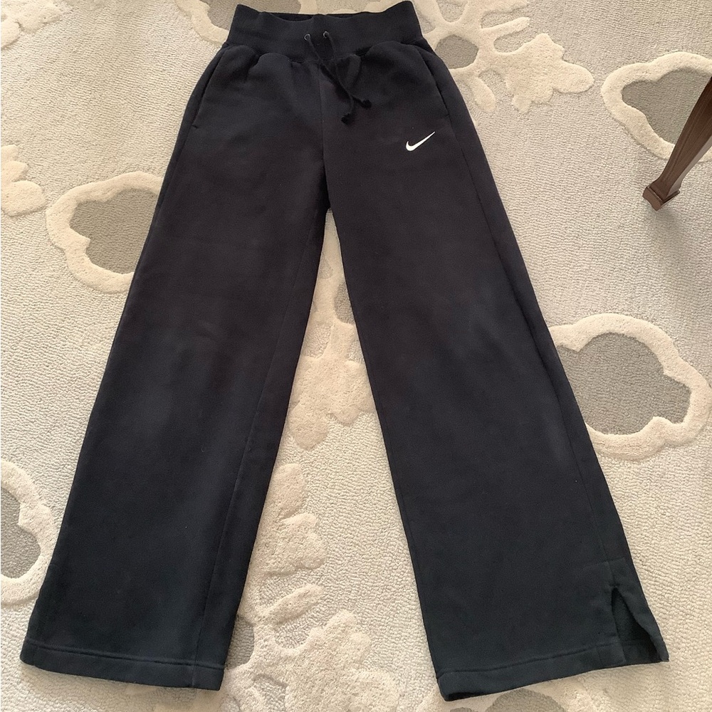 Nike Phoenix high waisted, wide legged sweatpants.